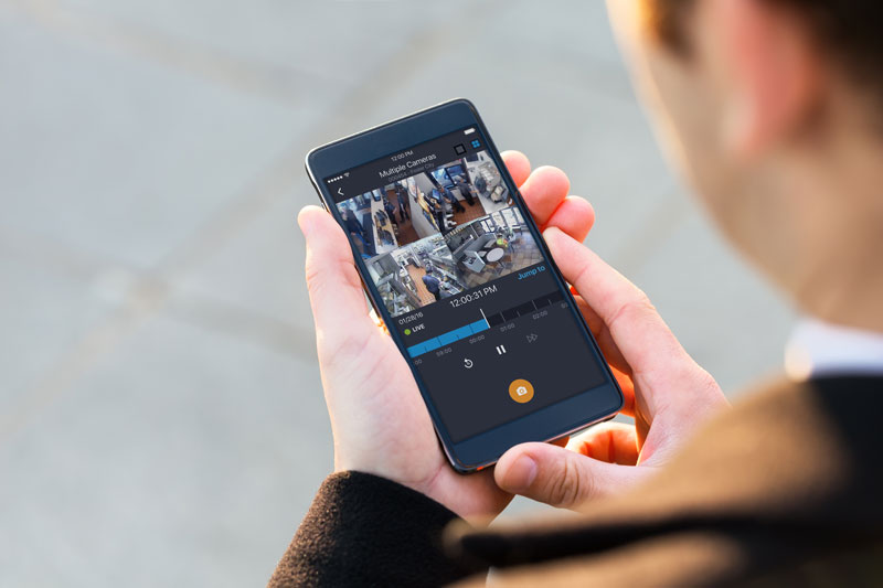 Man walking with phone with app