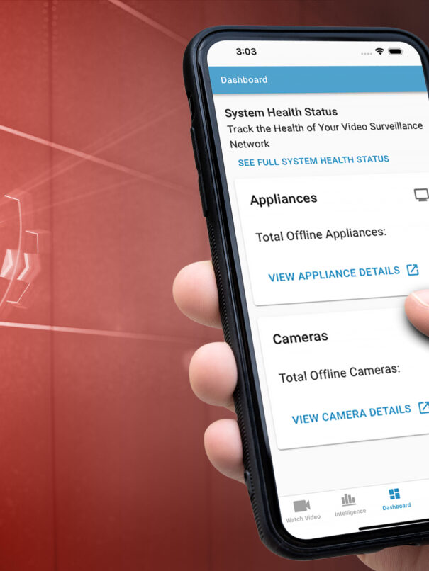 Mobile phone showing the System Health data, positioned next to a security camera.