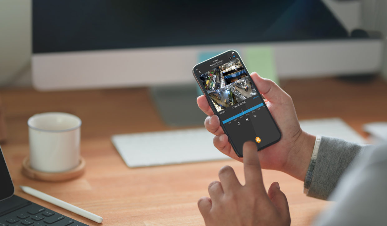Person using phone at their desk