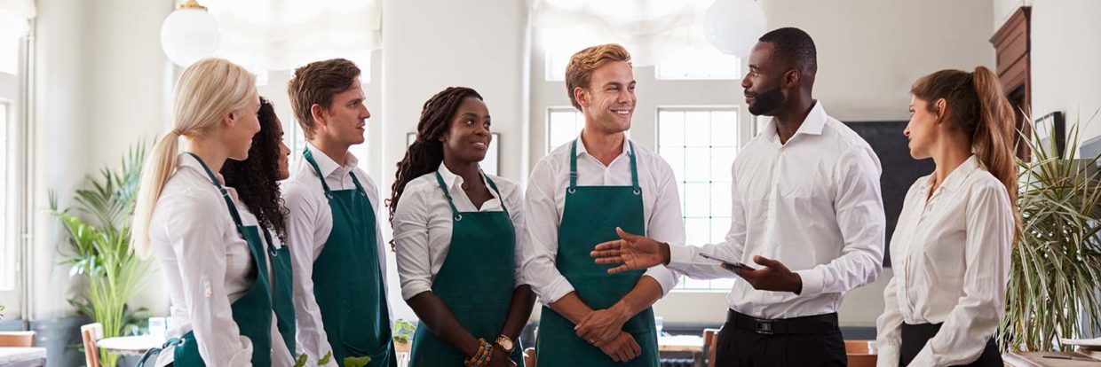 Managing a restaurant in form of a team meeting.