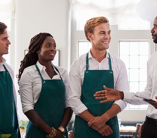 Managing a restaurant in form of a team meeting.